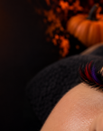 Black volume lash extensions with red and purple colour lashes for Halloween